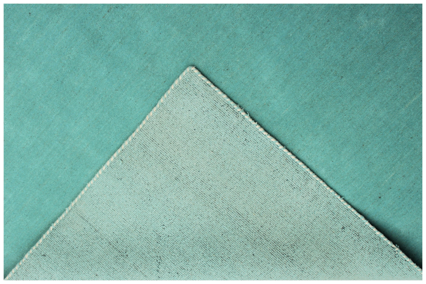 Custom made Modern Solid Turquoise Handloom wool area rug.