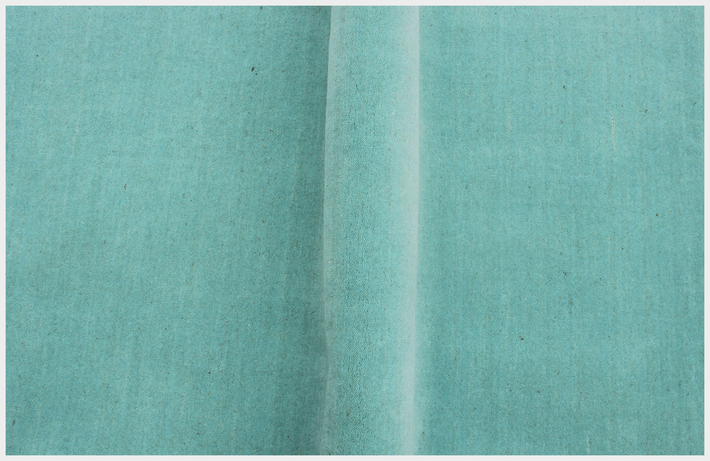 Custom made Modern Solid Turquoise Handloom wool area rug.