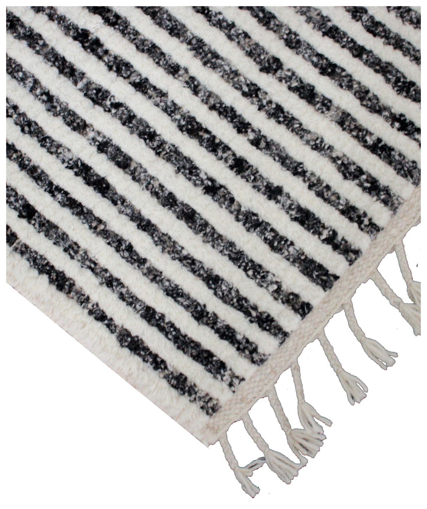 Black and white striped rug with tassels on a white background