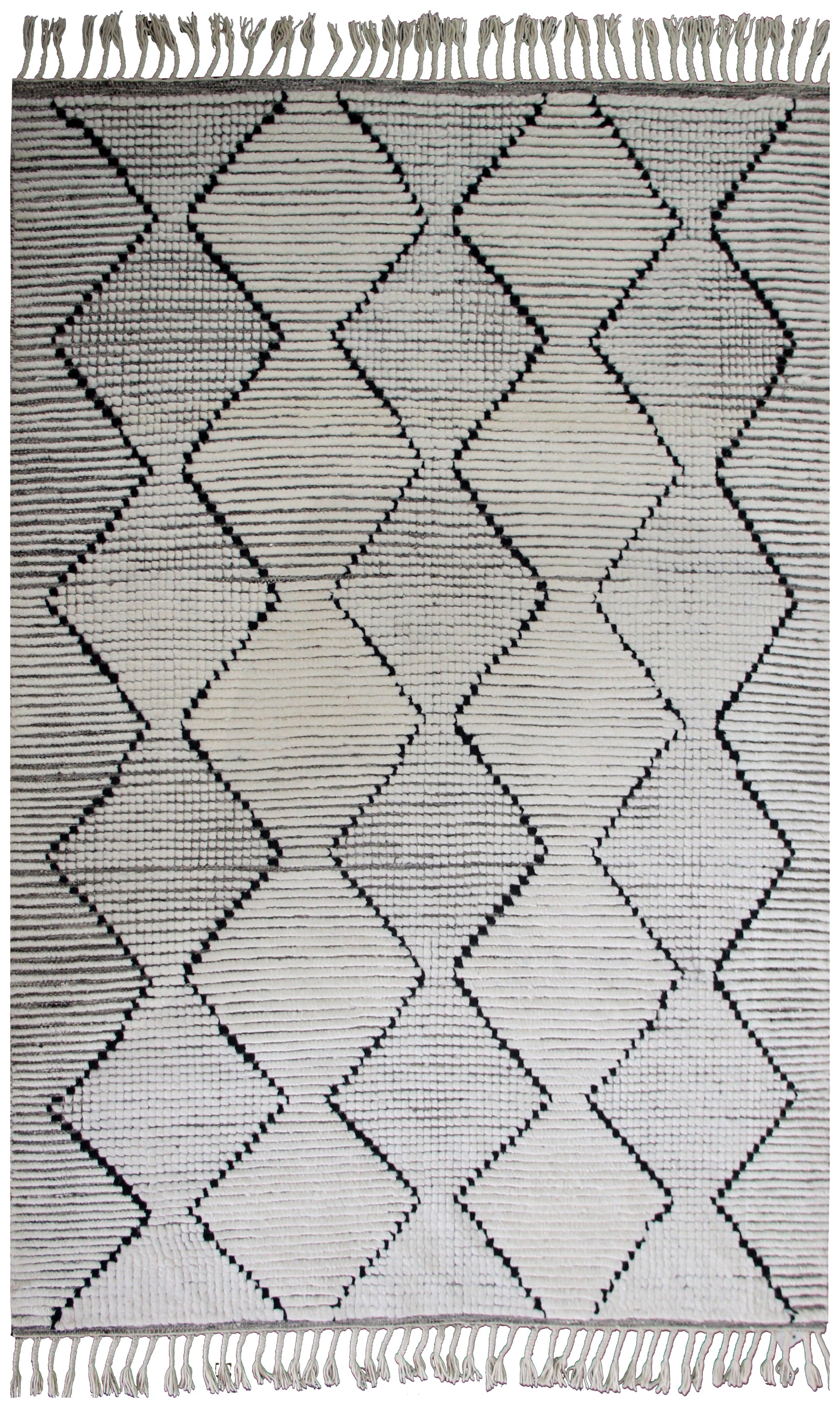 Textured rug with geometric pattern and fringe on a plain background