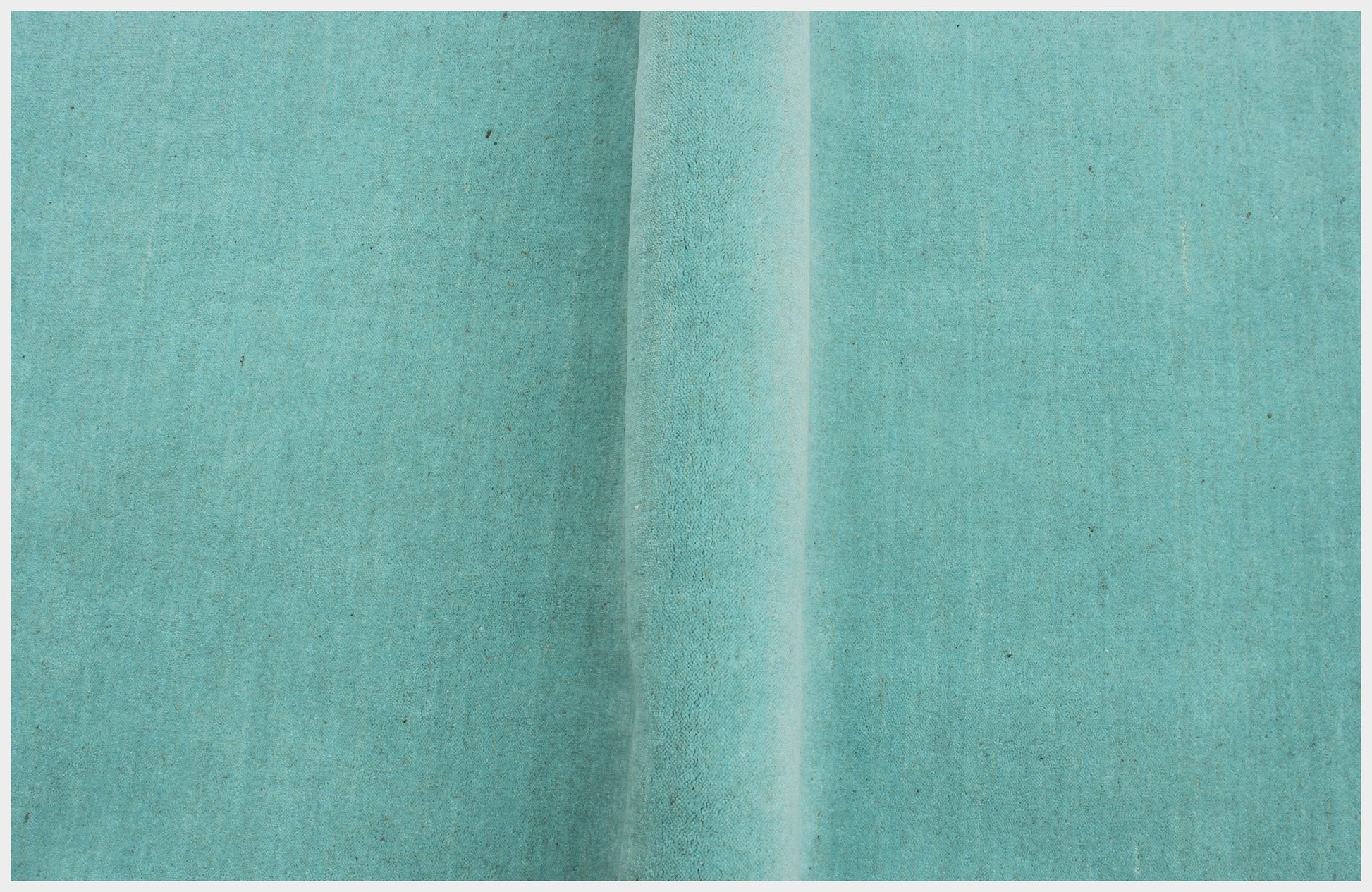 Custom made Modern Solid Turquoise Handloom wool area rug.